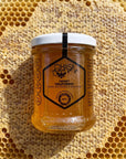 Jar of HASA stingless bee honey on honeycomb