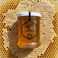Jar of HASA stingless bee honey on honeycomb
